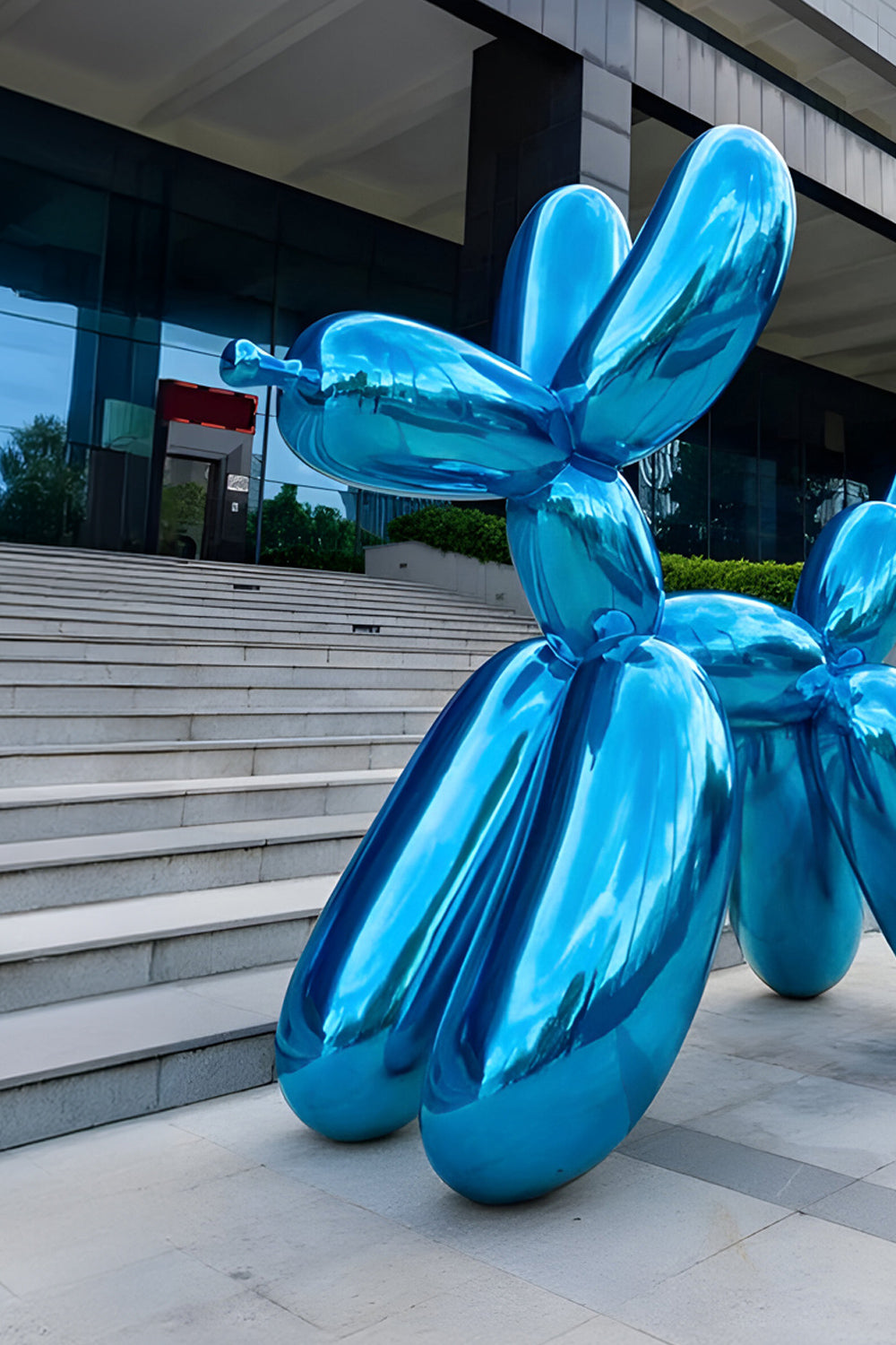 Sapphire Blue Dog Sculpture by Giant Bears, a striking large-scale sculpture with a glossy sapphire finish, ideal for creating a captivating focal point in modern environments.