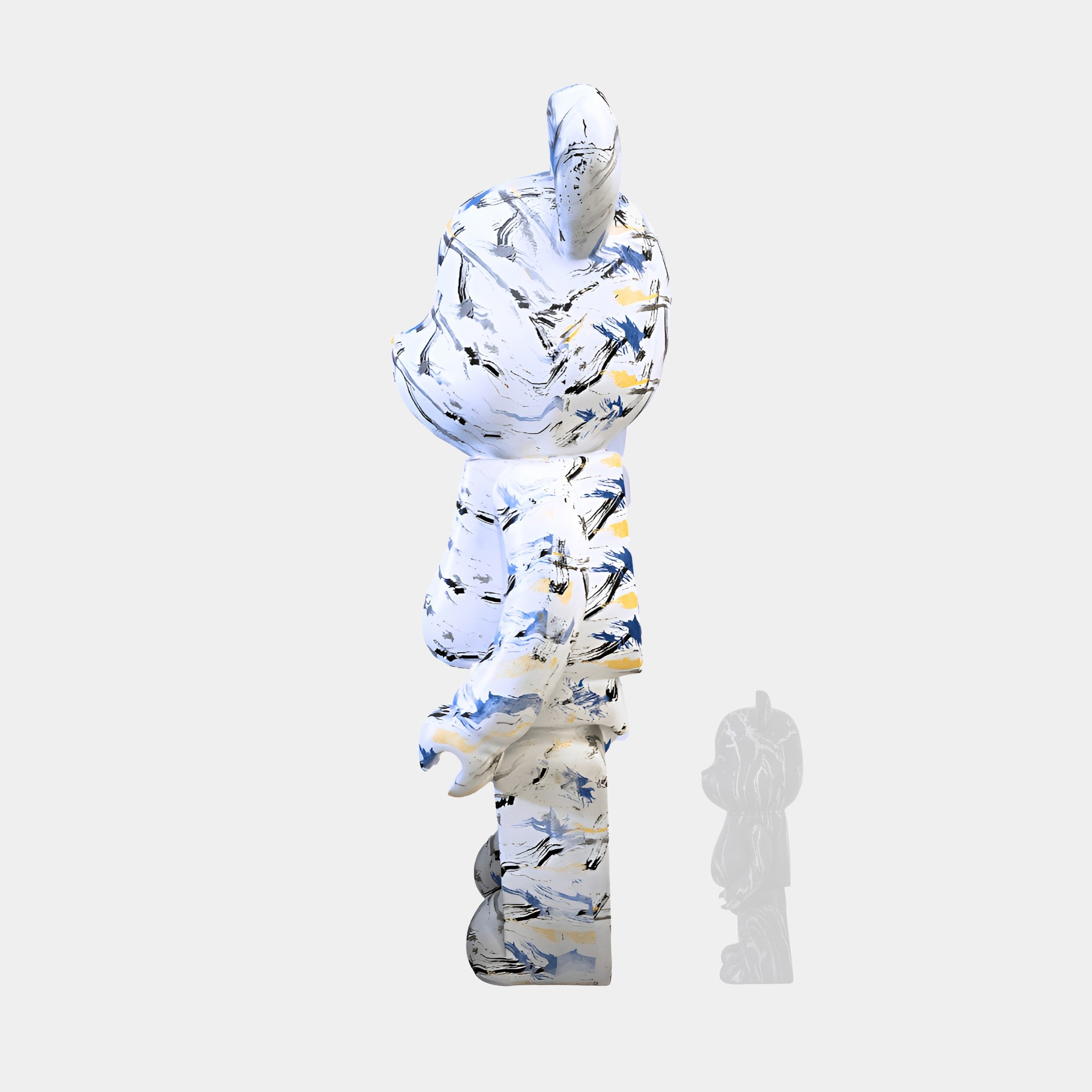 Profile view of the Indigo Infinity bear sculpture, highlighting the fluid indigo and yellow design with elegant contours.